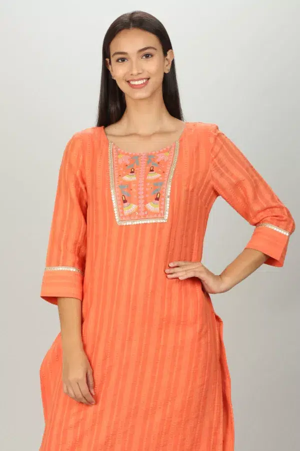 Embroidered And Textured Orange Kurta For Women