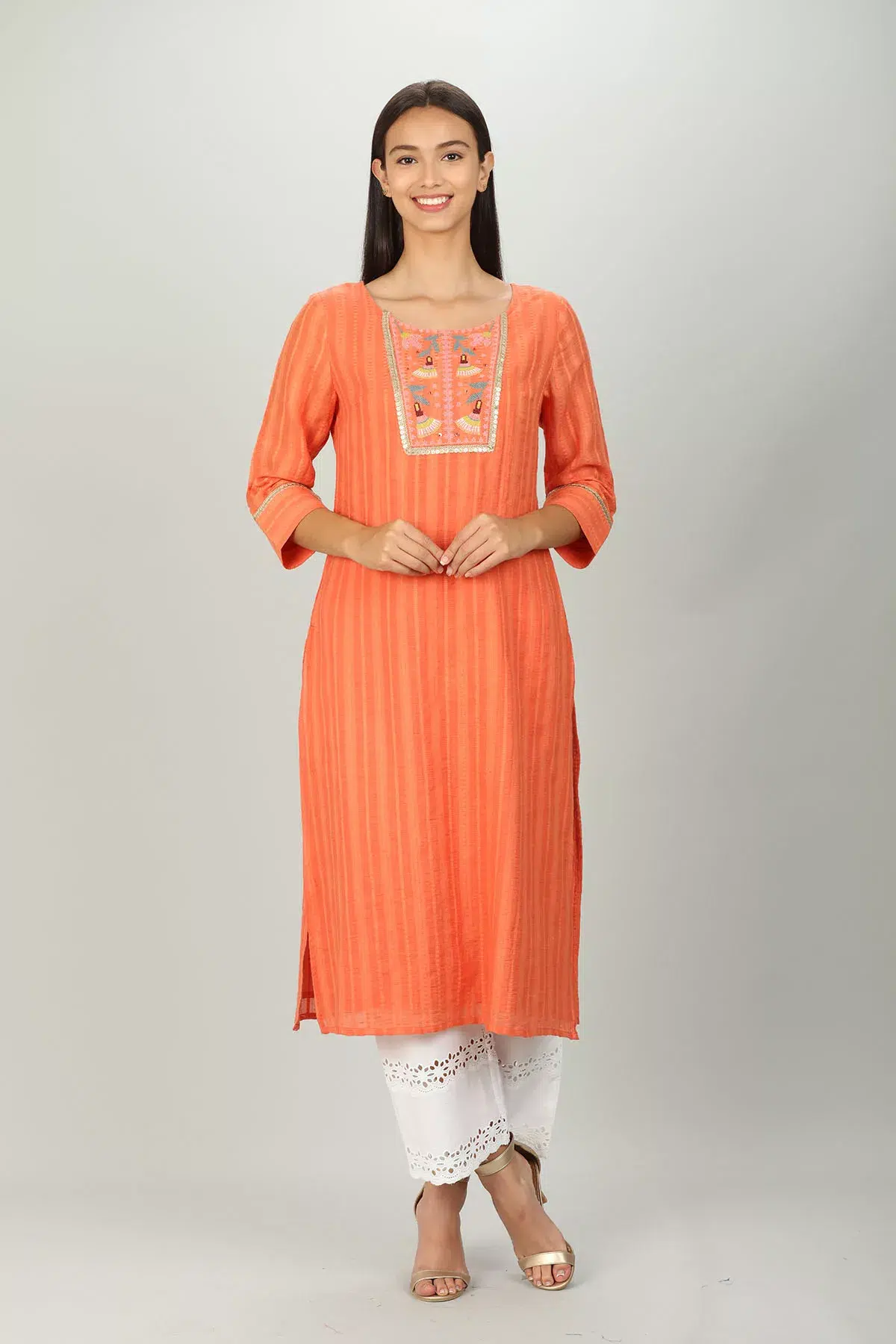 Embroidered And Textured Orange Kurta For Women