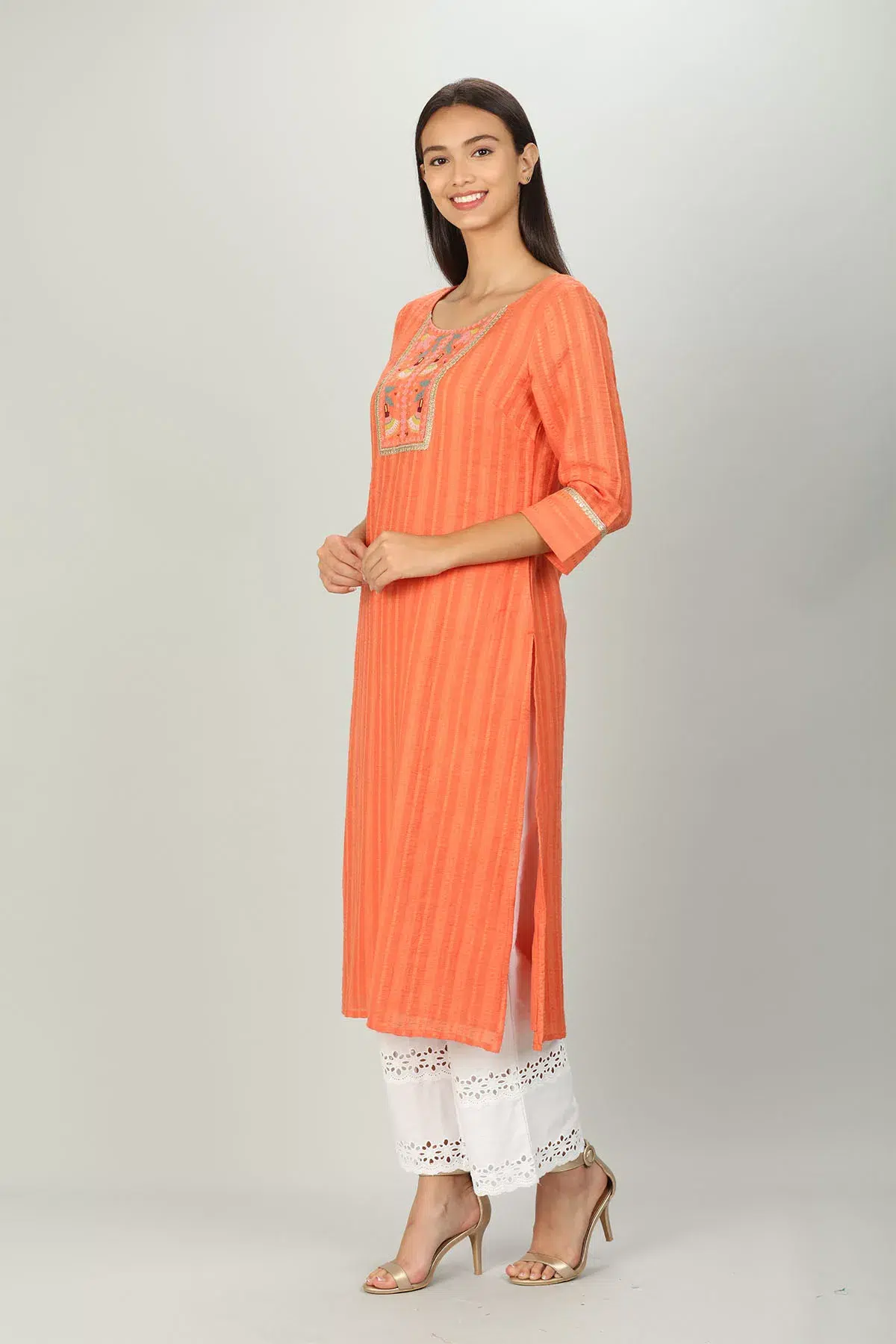 Embroidered And Textured Orange Kurta For Women