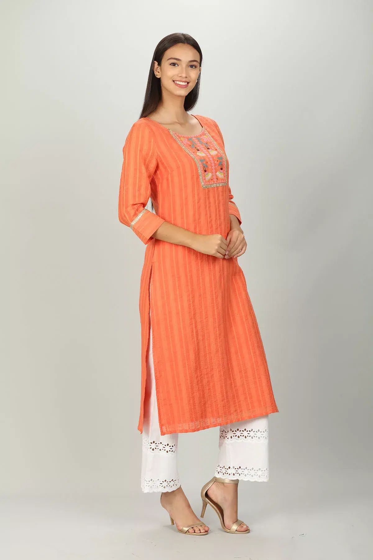 Embroidered And Textured Orange Kurta For Women
