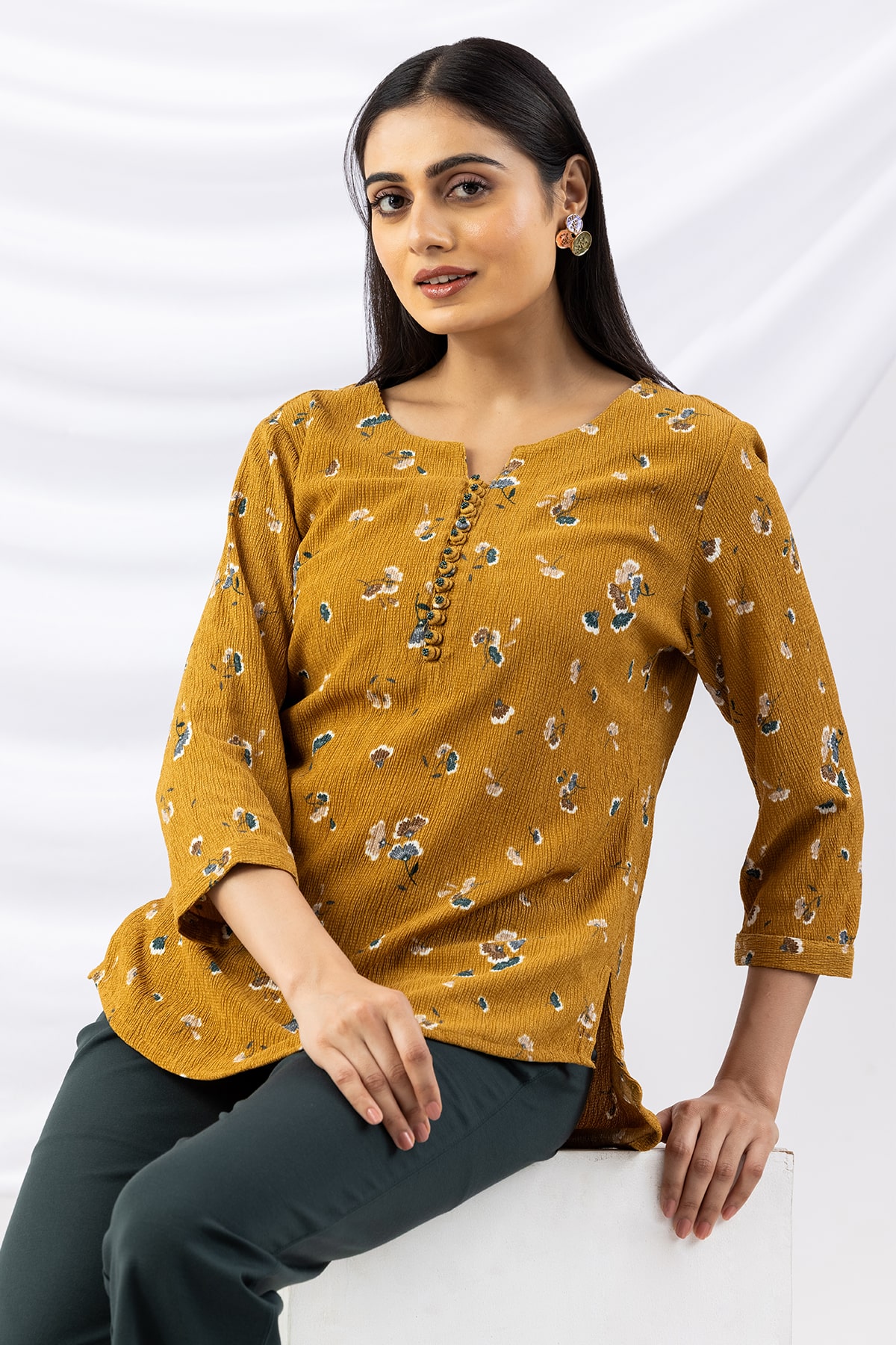 mustard top printed crepe round neck with 3/4 sleeves