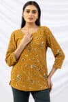 mustard top printed crepe round neck with 3/4 sleeves