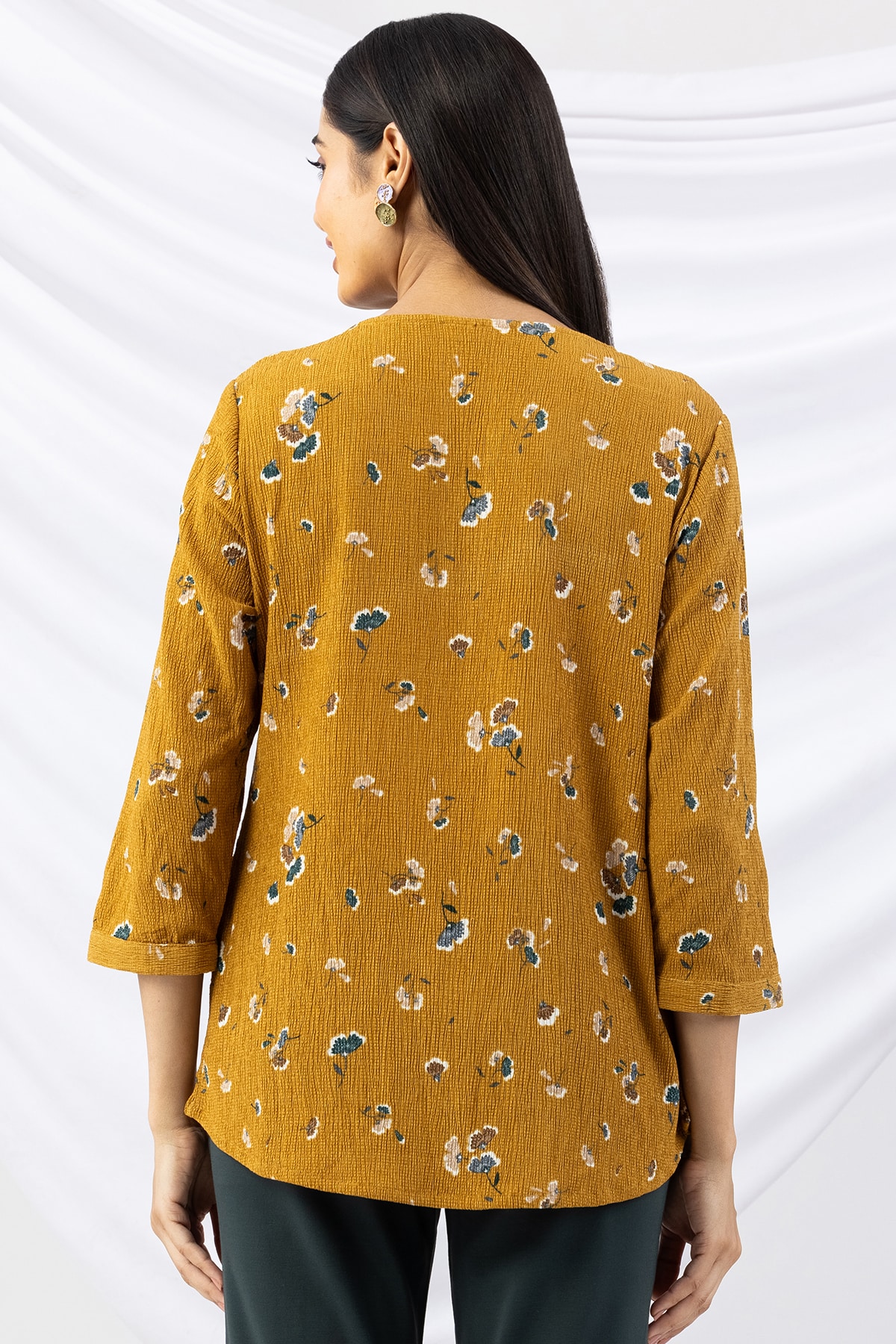 mustard top printed crepe round neck with 3/4 sleeves