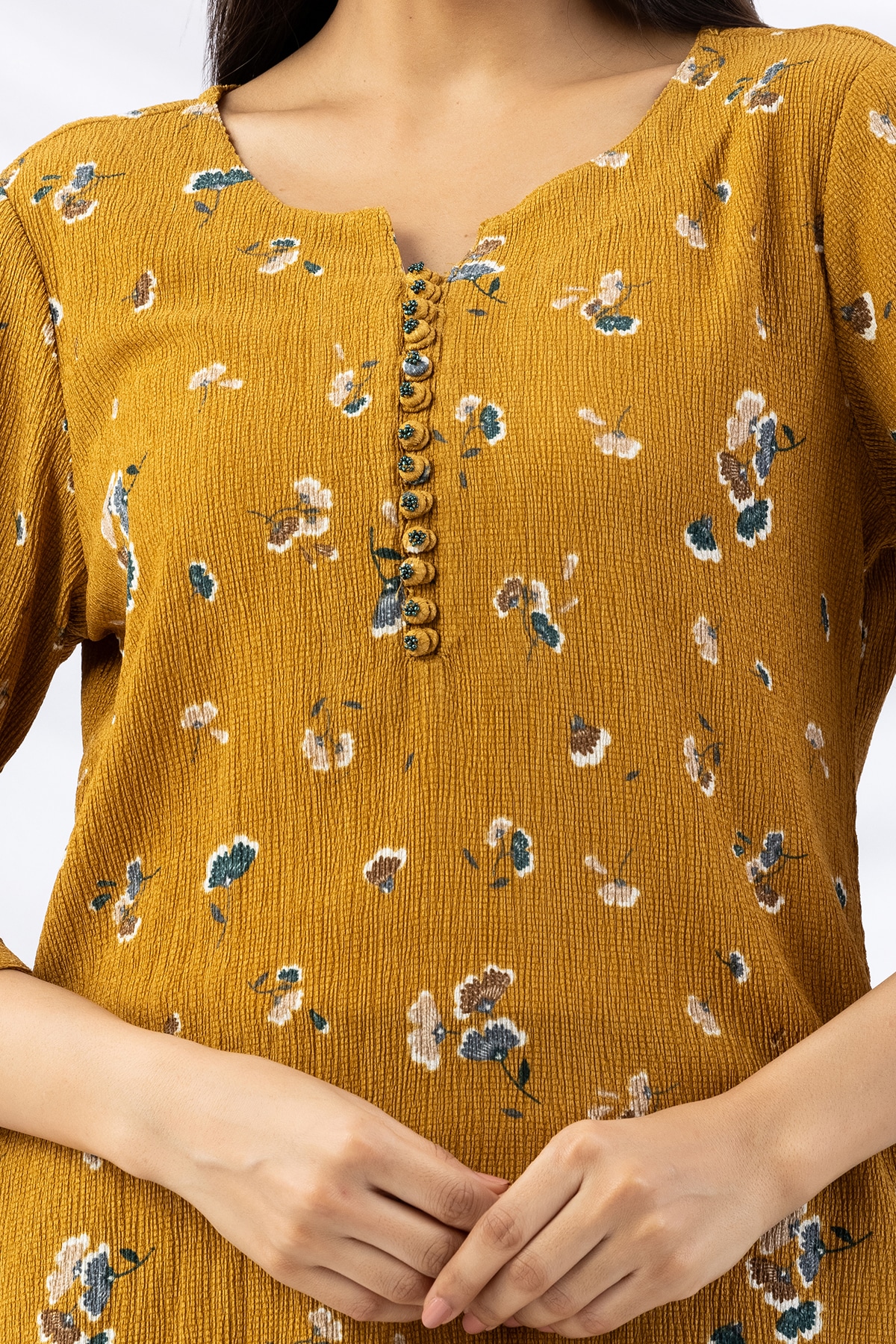 mustard top printed crepe round neck with 3/4 sleeves