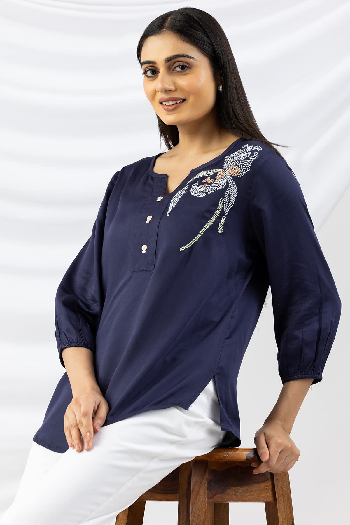 Navy blue embroidered modal satin top for ladies with round neck and 3/4 sleeves
