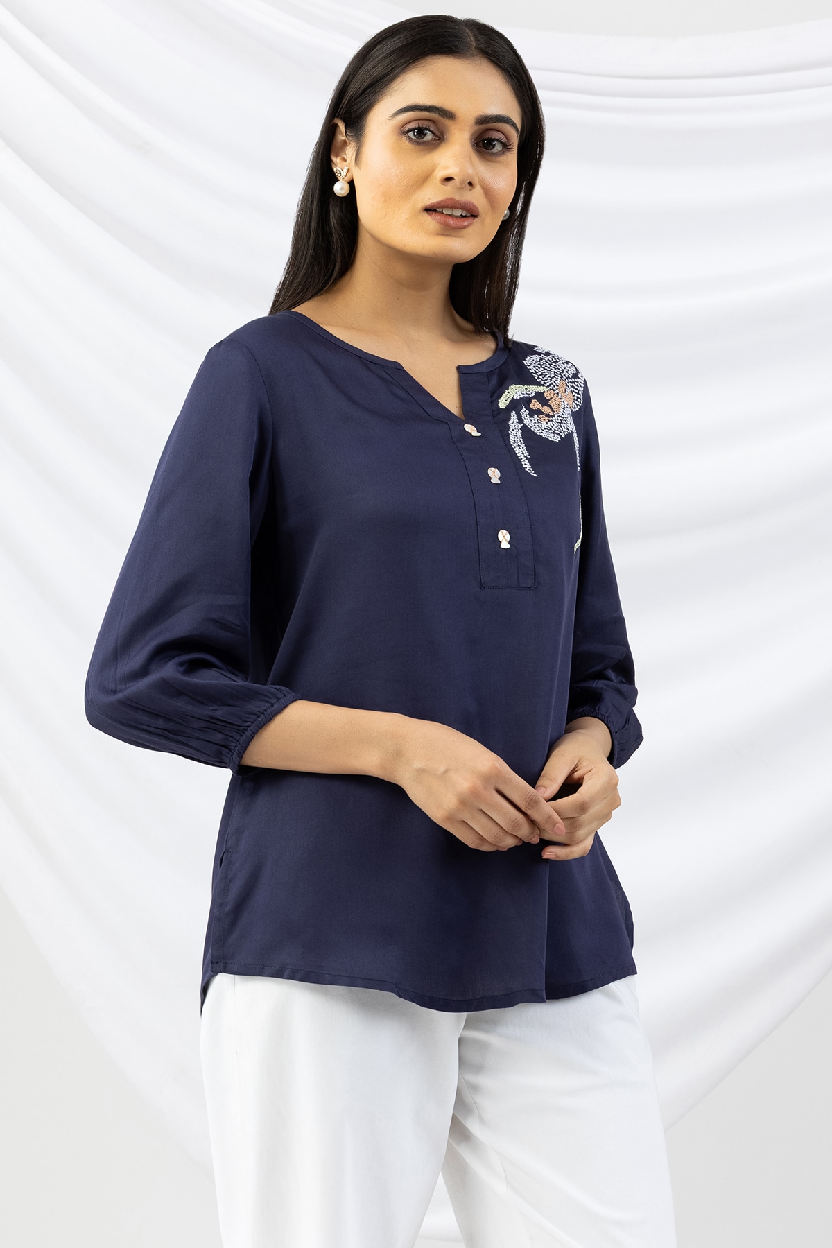Navy blue embroidered modal satin top for ladies with round neck and 3/4 sleeves