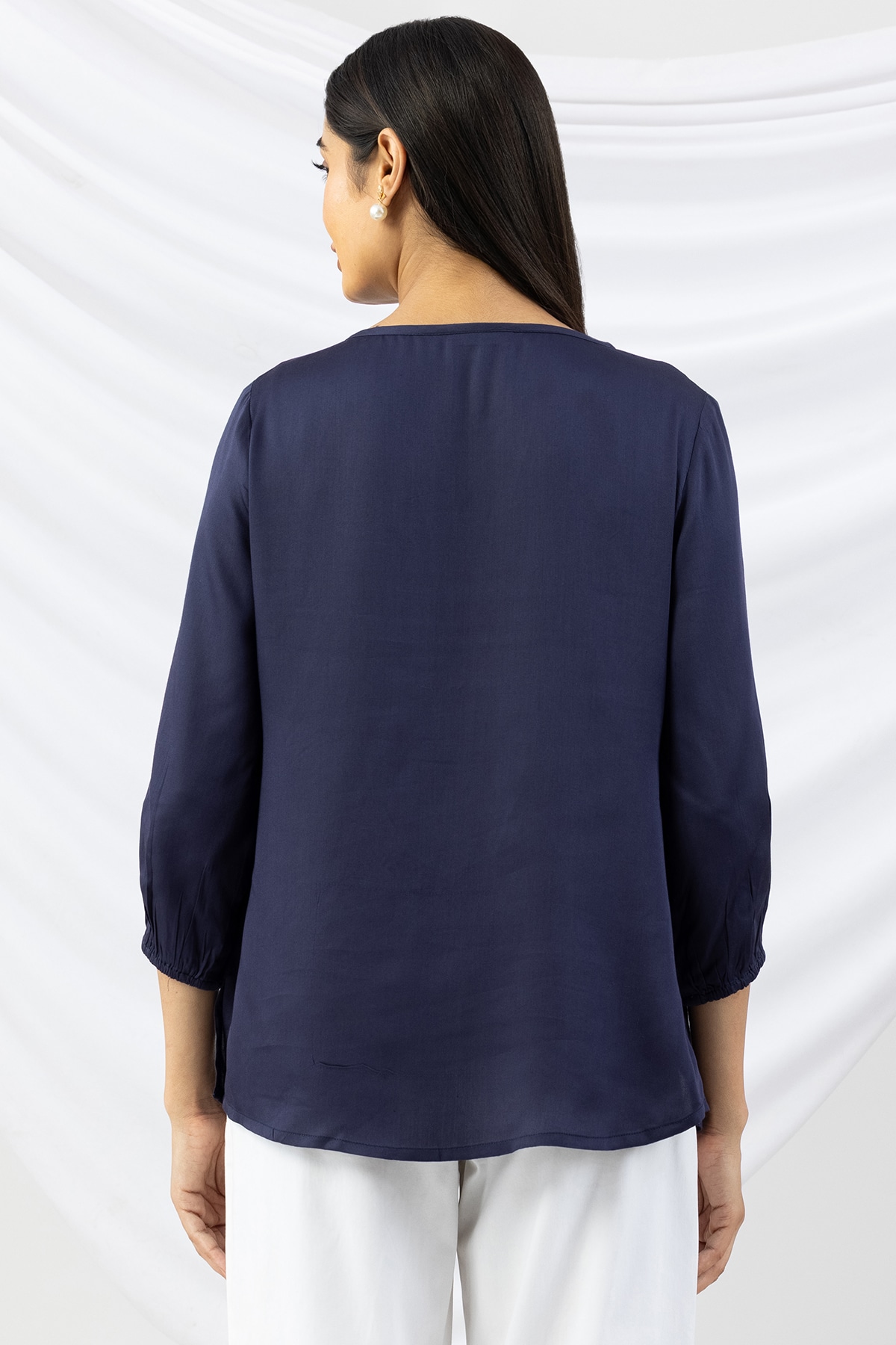 Navy blue embroidered modal satin top for ladies with round neck and 3/4 sleeves