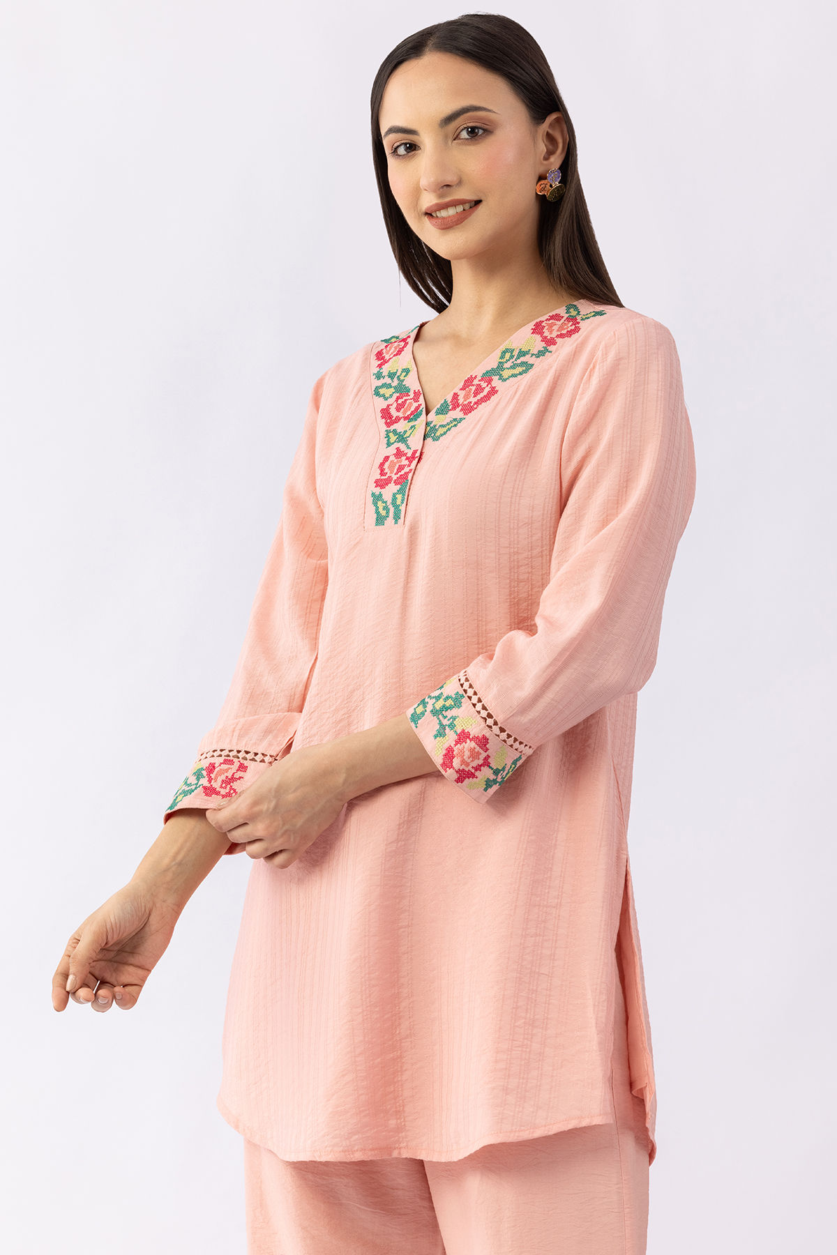 Peach co-ord set for women with embroidered V neck top and pants