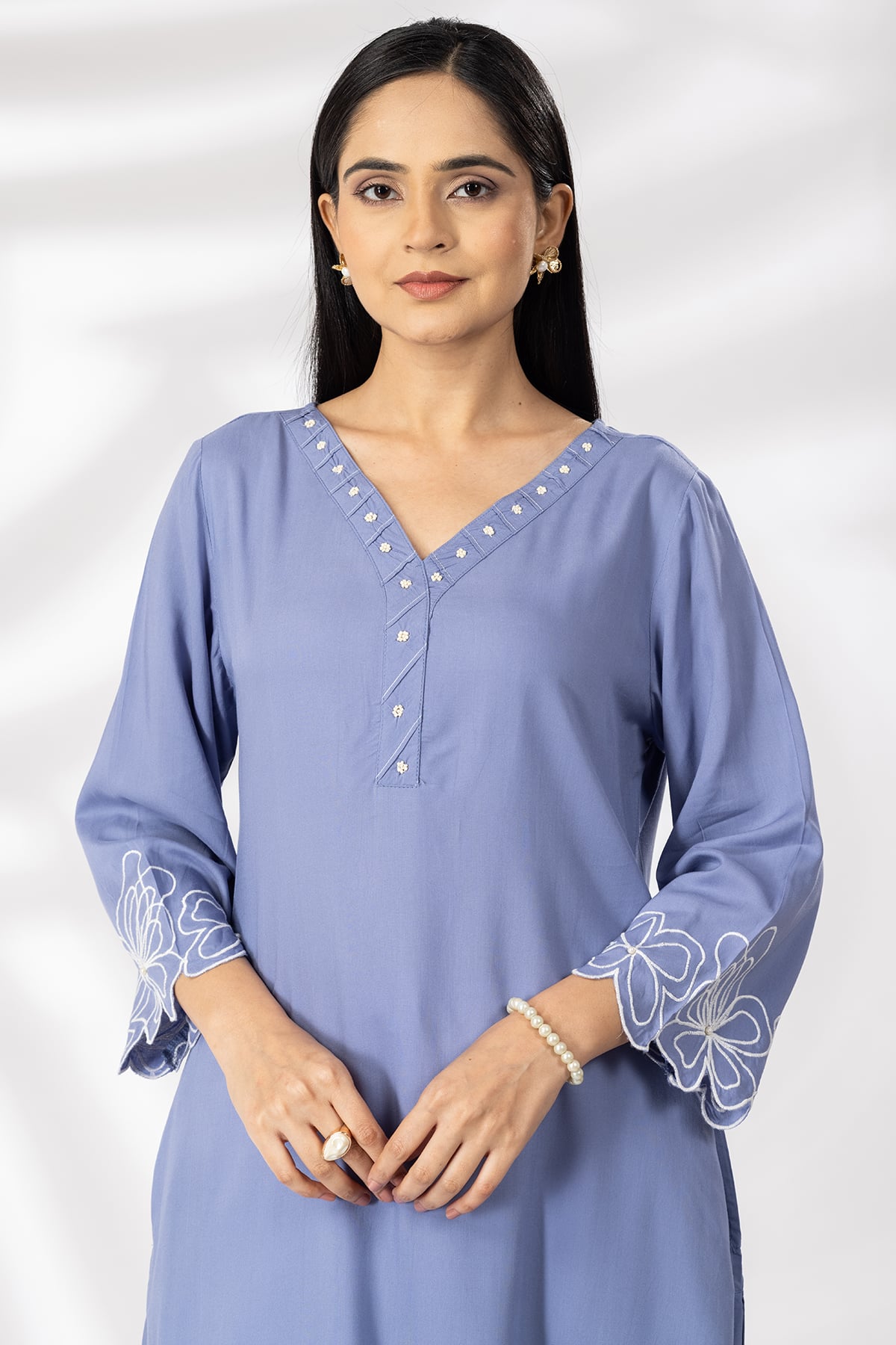Embroidered blue rayon modal kurti for women with V neck and 3/4 sleeves