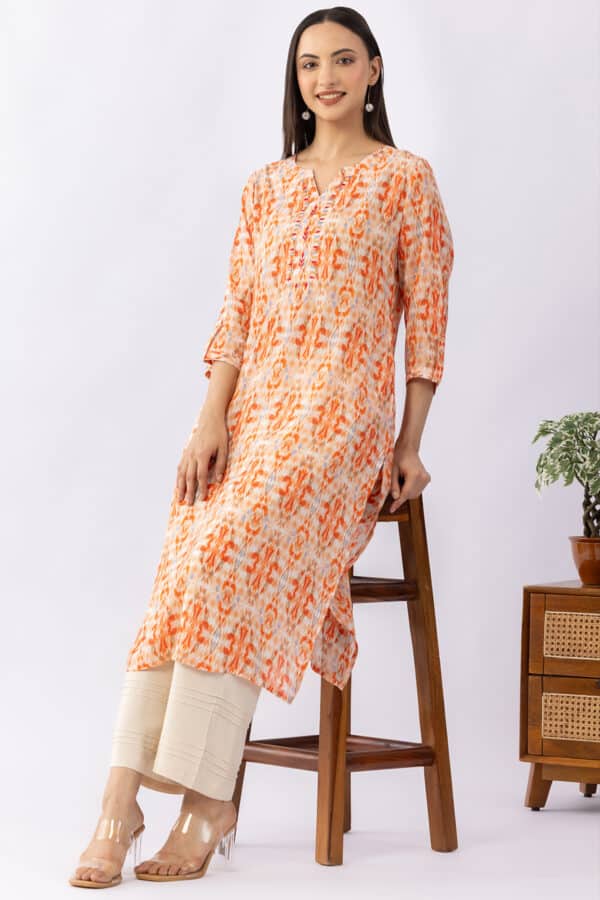 Embroidered orange viscose modal kurti for women with round neck and 3/4 sleeves