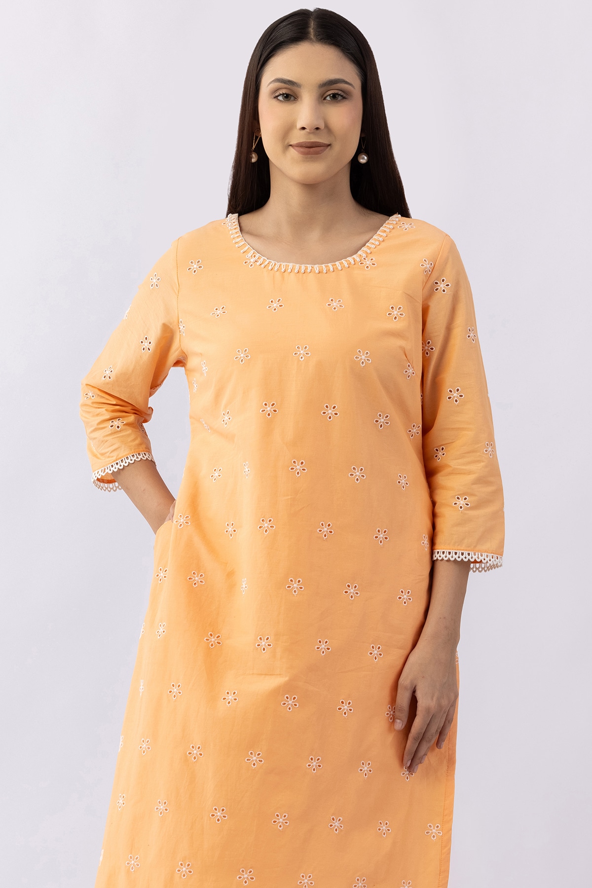Peach schiffli cotton kurti for women with round neck and 3/4 sleeves