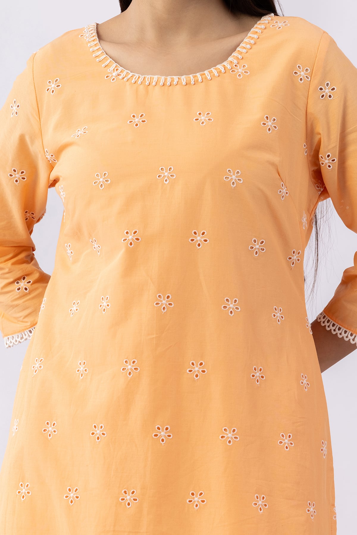 Peach schiffli cotton kurti for women with round neck and 3/4 sleeves